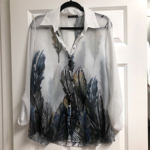 Sheer floral pattern blouse with roll-up sleeves